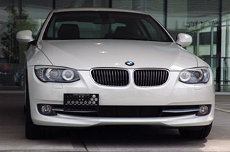 http://www.usmillworks.com/Assets/BMW/2011_E92_BMW_335i_front_license_plate_mount_bracket_tow_hook_300.jpg